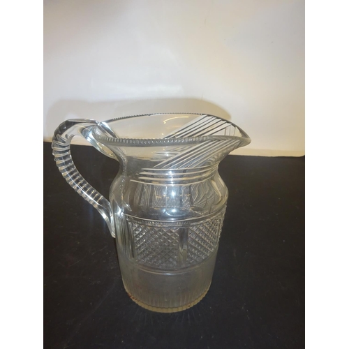 388 - Antique cut glass jug possibly Cork or Waterford. H. 18cm. (damaged, cracked)