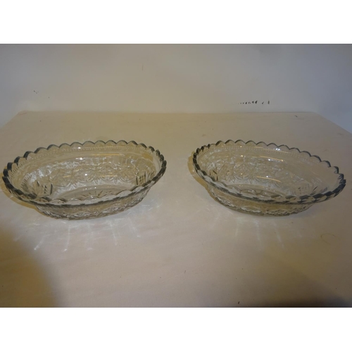 392 - A pair of antique Irish cut glass dishes. Diameter 26cm.