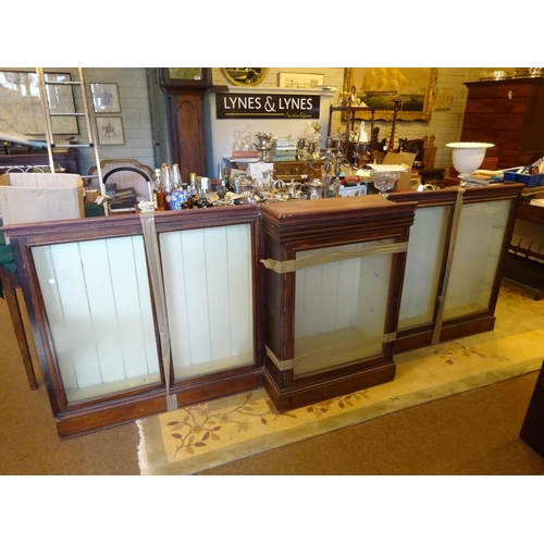 48 - Old timber breakfront shop cabinet with glass shelves, as found.  L. 265cm, H. 95cm approx.