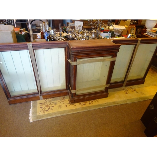 48 - Old timber breakfront shop cabinet with glass shelves, as found.  L. 265cm, H. 95cm approx.