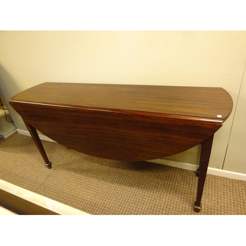 52 - Mahogany drop leaf hunt style table. L. 157cm.