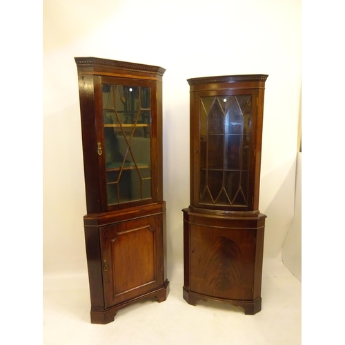 54 - Two mahogany corner cabinets - one antique and one modern.