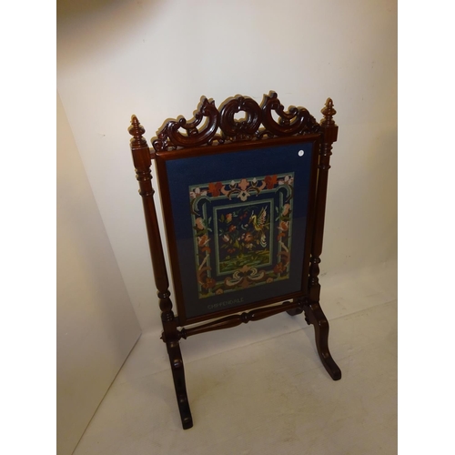 55 - Good mahogany firescreen with needlework inset. H. 110cm, W. 66cm.