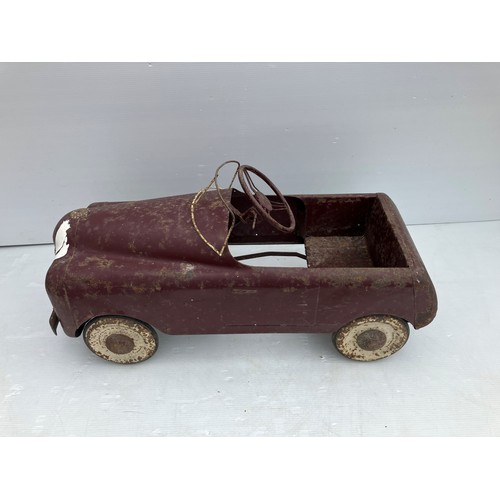 478 - Old metal child's pedal car. Circa 1950.