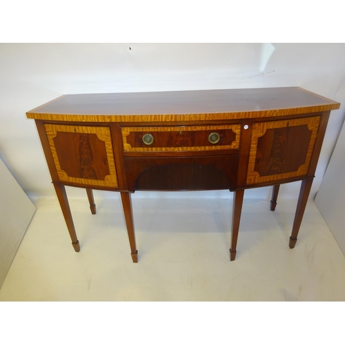 104 - Antique mahogany and satinwood banded sideboard, the bow shaped top over cupboards and drawers and r... 