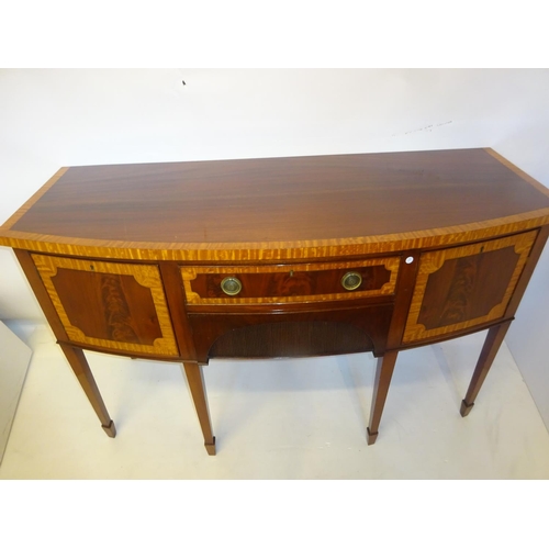 104 - Antique mahogany and satinwood banded sideboard, the bow shaped top over cupboards and drawers and r... 