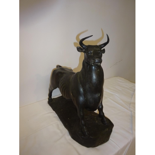 106 - Bronze bull sculpture. L. 34cm, H. 34cm, W. 14cm.