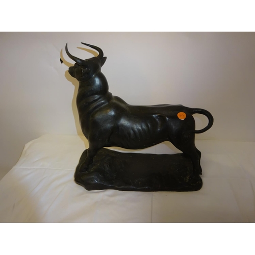 106 - Bronze bull sculpture. L. 34cm, H. 34cm, W. 14cm.