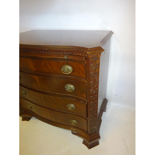 116 - A good George III style mahogany chest of drawers, the serpentine shaped top having dental cornice o... 