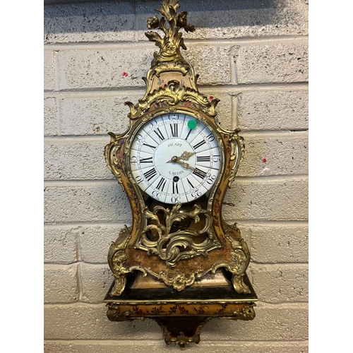 128 - A large antique painted wood and ormolu Cartel clock decorated with flowers, the dial is signed Pica... 