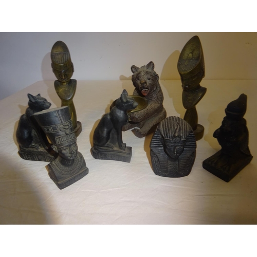 129 - Carved wood bear and other figures.