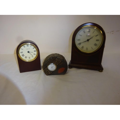 13 - Three modern mantel clocks.