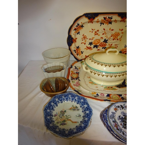 135 - Two large Victorian meat platters, collection of jelly moulds, China tureen and cover and a quantity... 