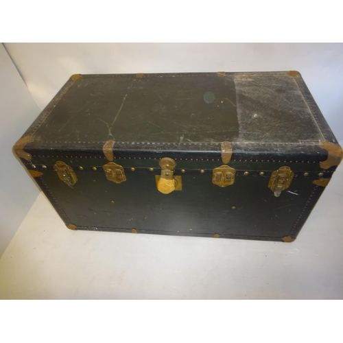 138 - Two large old liner trunks and a suitcase. (3)