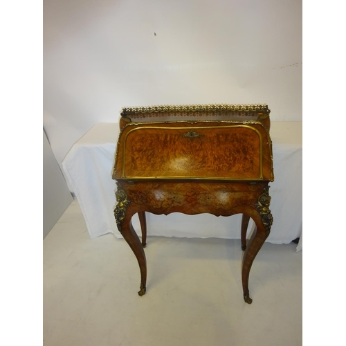 140 - Antique ladies walnut and kingswood writing desk having decorative brass gallery, nicely fitted inte... 