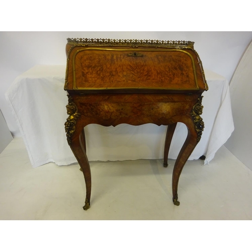 140 - Antique ladies walnut and kingswood writing desk having decorative brass gallery, nicely fitted inte... 