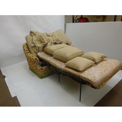 18 - A sofa cum folding out bed. W. 145cm.