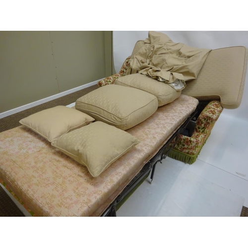 18 - A sofa cum folding out bed. W. 145cm.