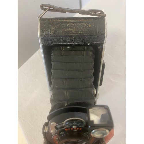 196 - Kodak No 2 Folding Autographic Brownie and a Triumph Folding Camera. (2) See photos.