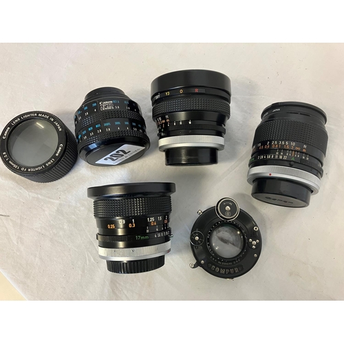 202 - Collection of lenses. See photos.