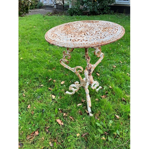 226 - Heavy cast iron garden table.