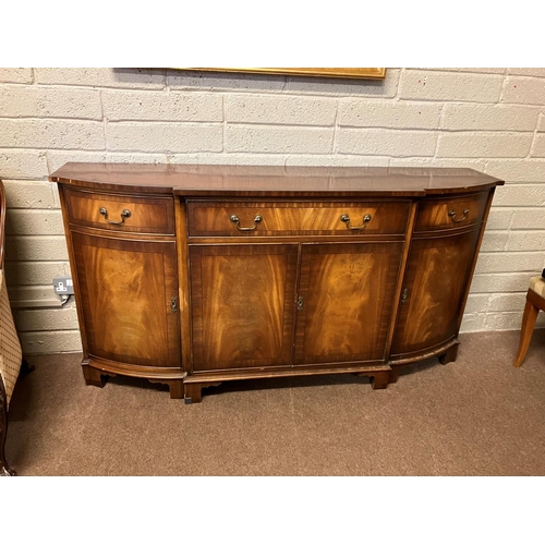 239 - Reproduction mahogany side cabinet fitted with cupboards and a drawer. W. 180cm, D. 43cm, H. 88cm ap... 