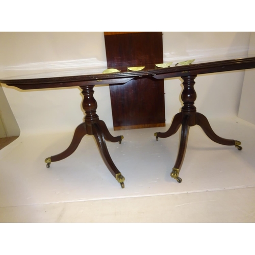 255 - Mahogany two pod dining table with crossbanded top and spare leaf. L. (without leaf) 176cm, W. 107cm... 