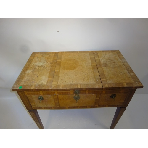 278 - Antique continental dressing table in birds eye maple with rosewood banding, the freize fitted with ... 