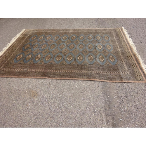 283 - Bokhara style rug, 285cm x 190cm. (some fading)