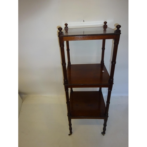 306 - Antique mahogany three tier what not with turned columns. H. 114cm. 40cm x 40cm.