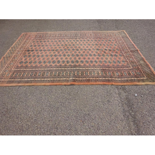 316 - Bokhara style rug, 275cm x 194cm, some fading.