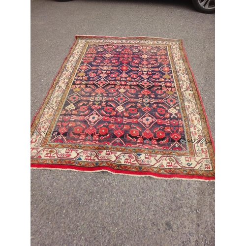 317 - Persian rug. 205cm x 153cm approx.