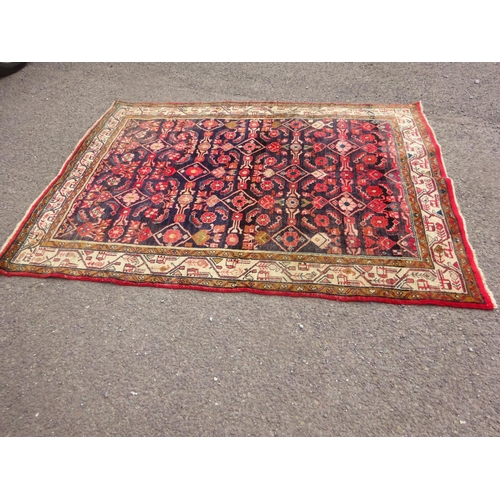 317 - Persian rug. 205cm x 153cm approx.