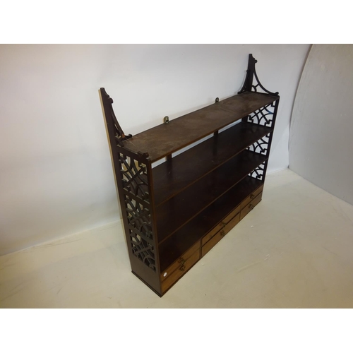 318 - Antique mahogany hanging shelves fitted with six drawers. W. 100cm, H. 94cm.