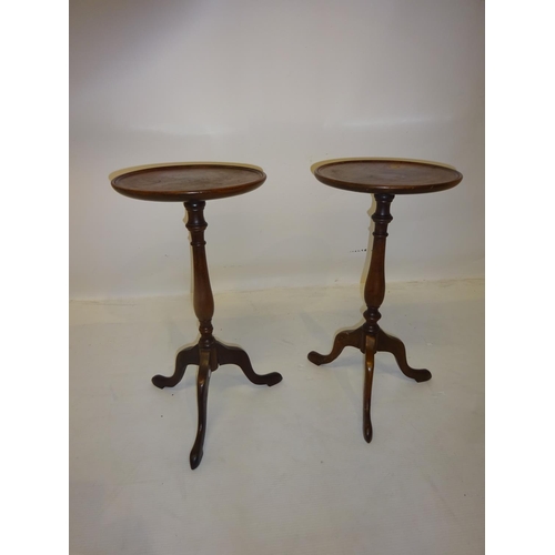 322 - Pair of mahogany wine tables.