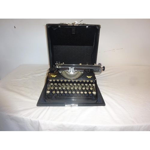 333 - Old portable typewriter.