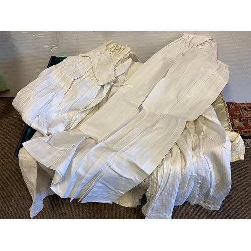 336 - A collection of old christening gowns, costume outfits, etc.