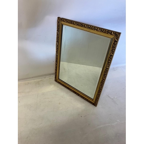 341 - Gilt framed mirror with bevelled glass plate. 70cm x 55cm approx.