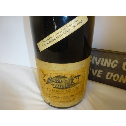 354 - A 1964 Magnum of French wine.