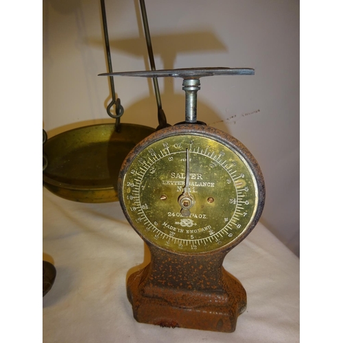 39 - A large antique brass & metal counter top scales and 3 smaller scales. (Height of large scales 88cm)... 