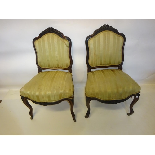 48 - A pair of antique French rosewood side chairs.