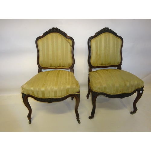 48 - A pair of antique French rosewood side chairs.