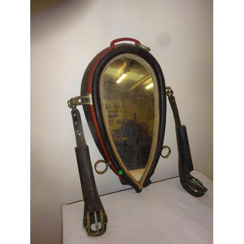 54 - Leather saddle and a harness mirror.