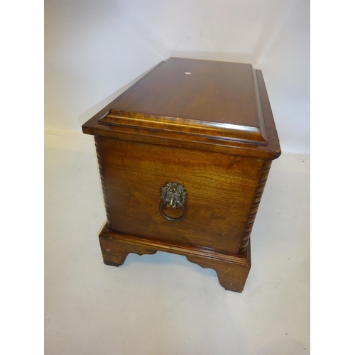 55 - Antique mahogany storage box having lion mask handles and raised on bracket feet. W. 67cm, D. 40cm, ... 