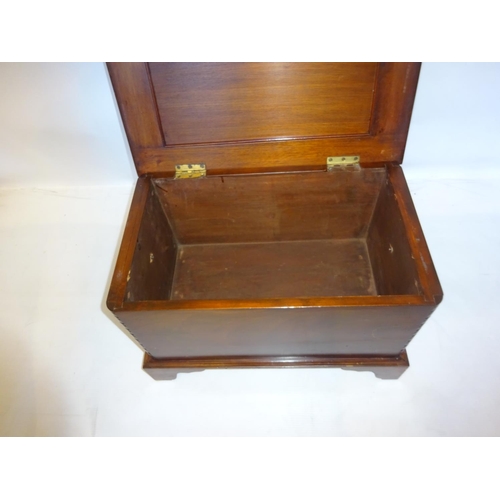 55 - Antique mahogany storage box having lion mask handles and raised on bracket feet. W. 67cm, D. 40cm, ... 