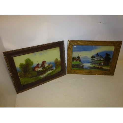 57 - A pair of framed Victorian pictures on glass, landscapes with castles. 40cm x 60cm.