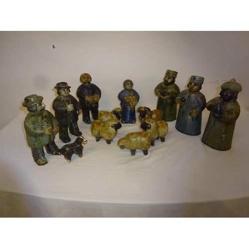 59 - A collection of pottery crib figures.