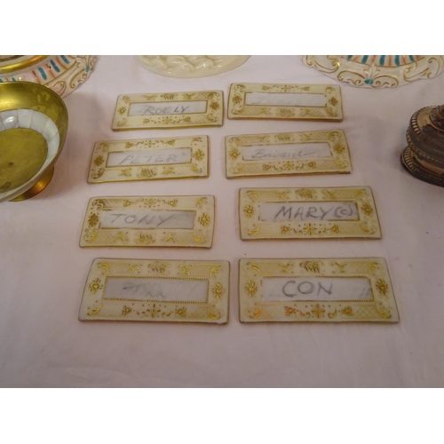 63 - Mixed lot - pair of continental porcelain candleabra (damaged), 8 Dresden dinner name plates, beleek... 