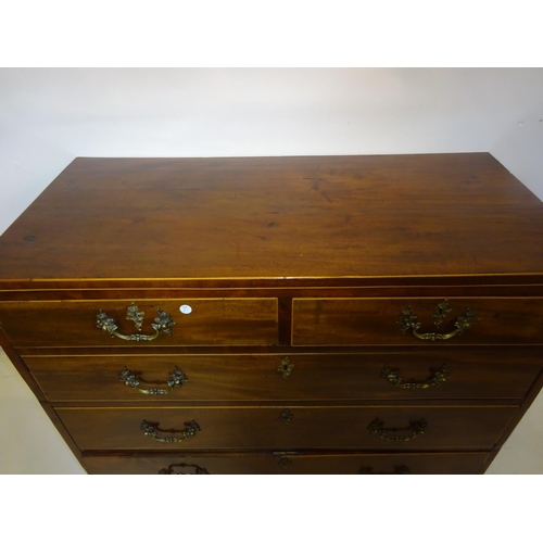 70 - A fine antique mahogany chest of 4 graduated drawers having brass handles and raised on bracket feet... 