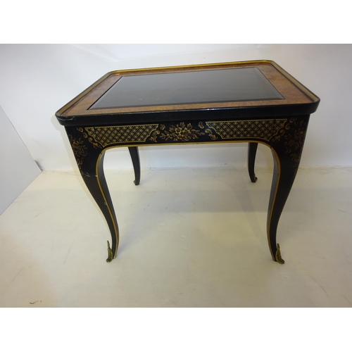 72 - A decorative walnut continental occasional table fitted with a drawer and having painted legs and gl... 